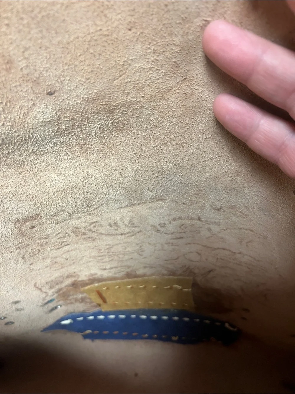 Hand-Tooled Tan Leather Briefcase with Embossed Motifs